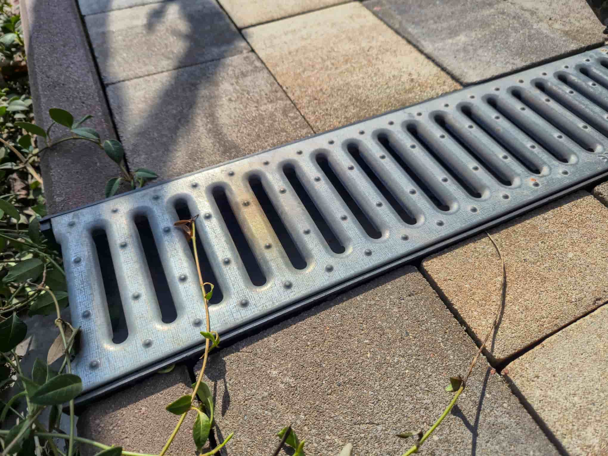 7 Best Backyard Drainage Solutions for Fall: French Drains, Retaining Walls, and Grading Fixes